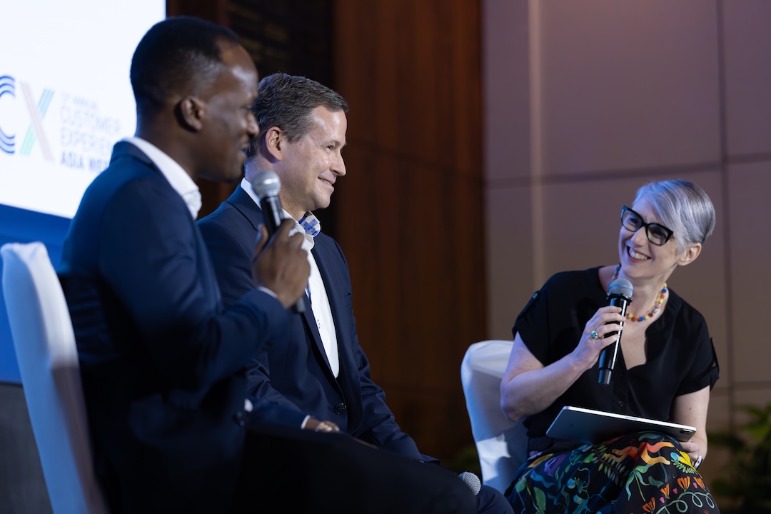 Katja Forbes in conversation on a CX Asia panel