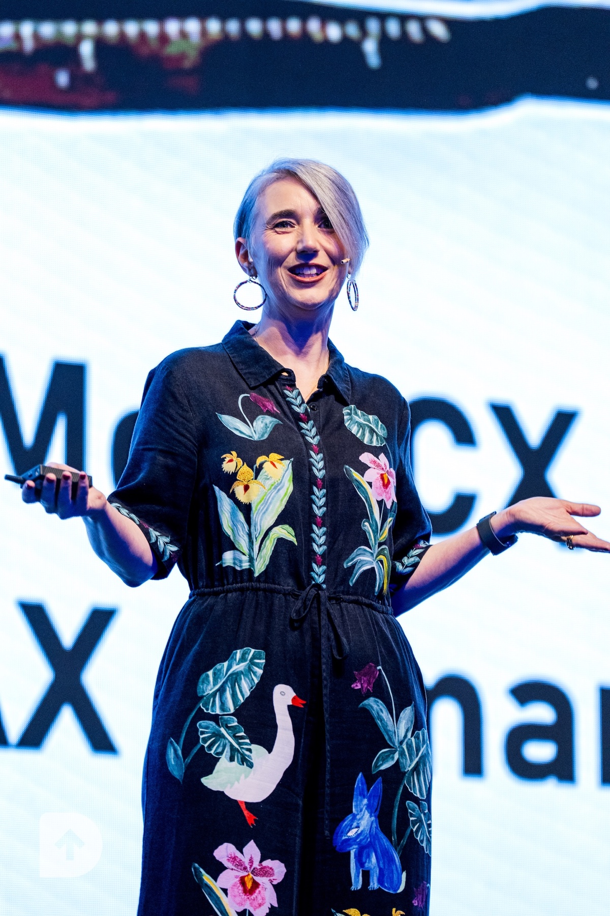 Katja Forbes speaking on stage at DesignUp